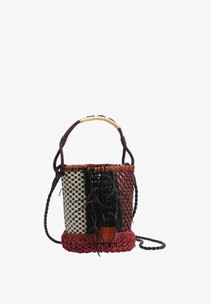 Small woven bucket bag with vertical checkered, black braided, and reddish panels, a braided handle, and a long braided shoulder strap.