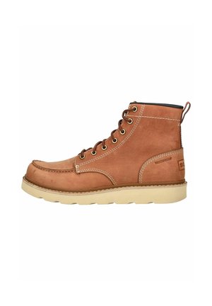 Brown waterproof leather ankle boot with white stitching, round toe, and light beige rubber sole. Features metal eyelets and pull tab.