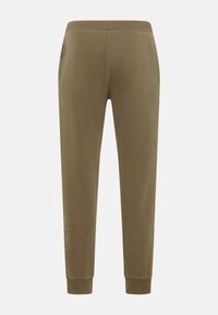 Olivengrønne sweats med tekstureret finish, ribbet talje og manchetter, der har en sidelomme og prægede "SAND" tekstdetaljer.