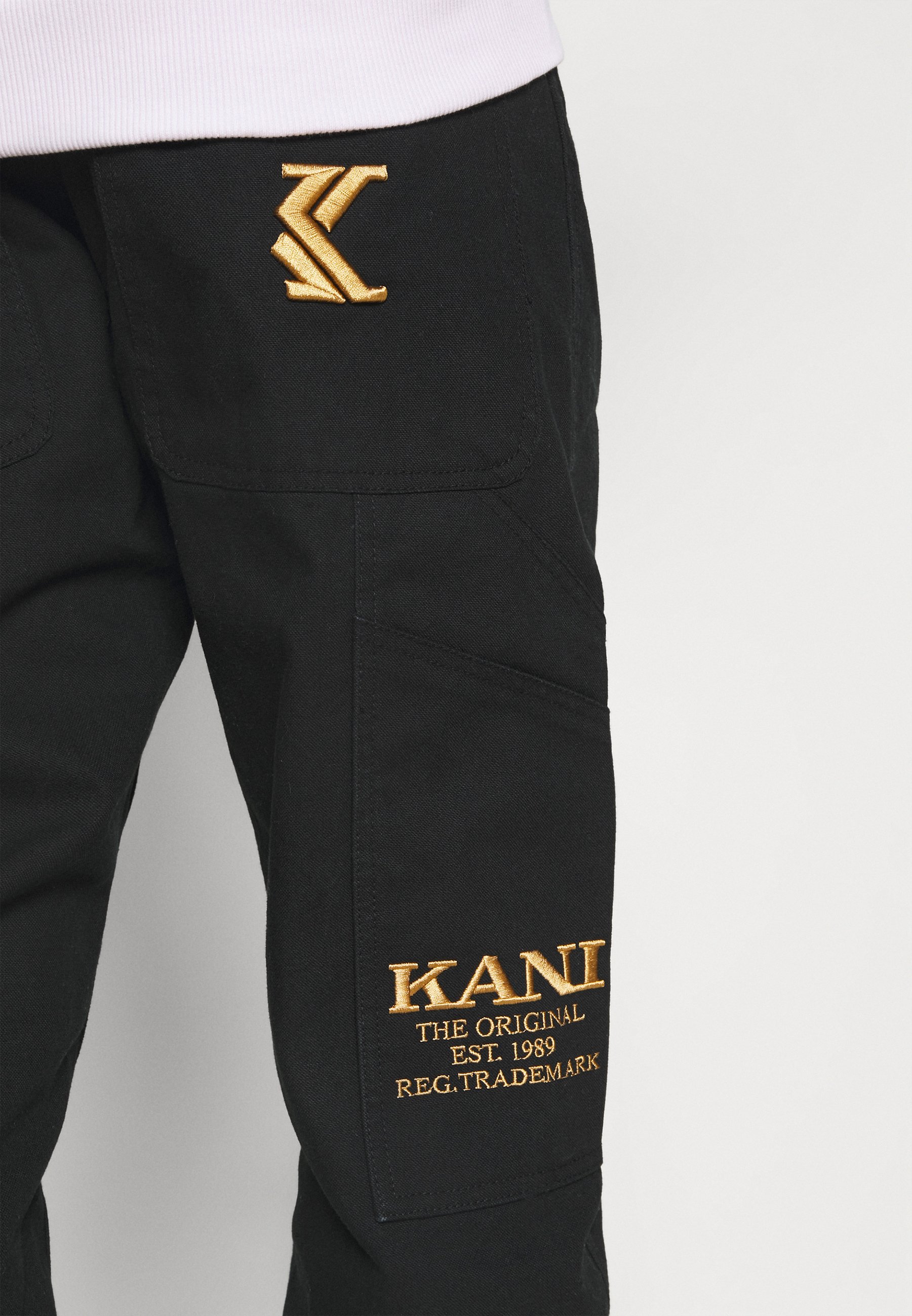 Karl Kani OG PANTS UNISEX - Pantalones cargo - black/negro - Zalando.es