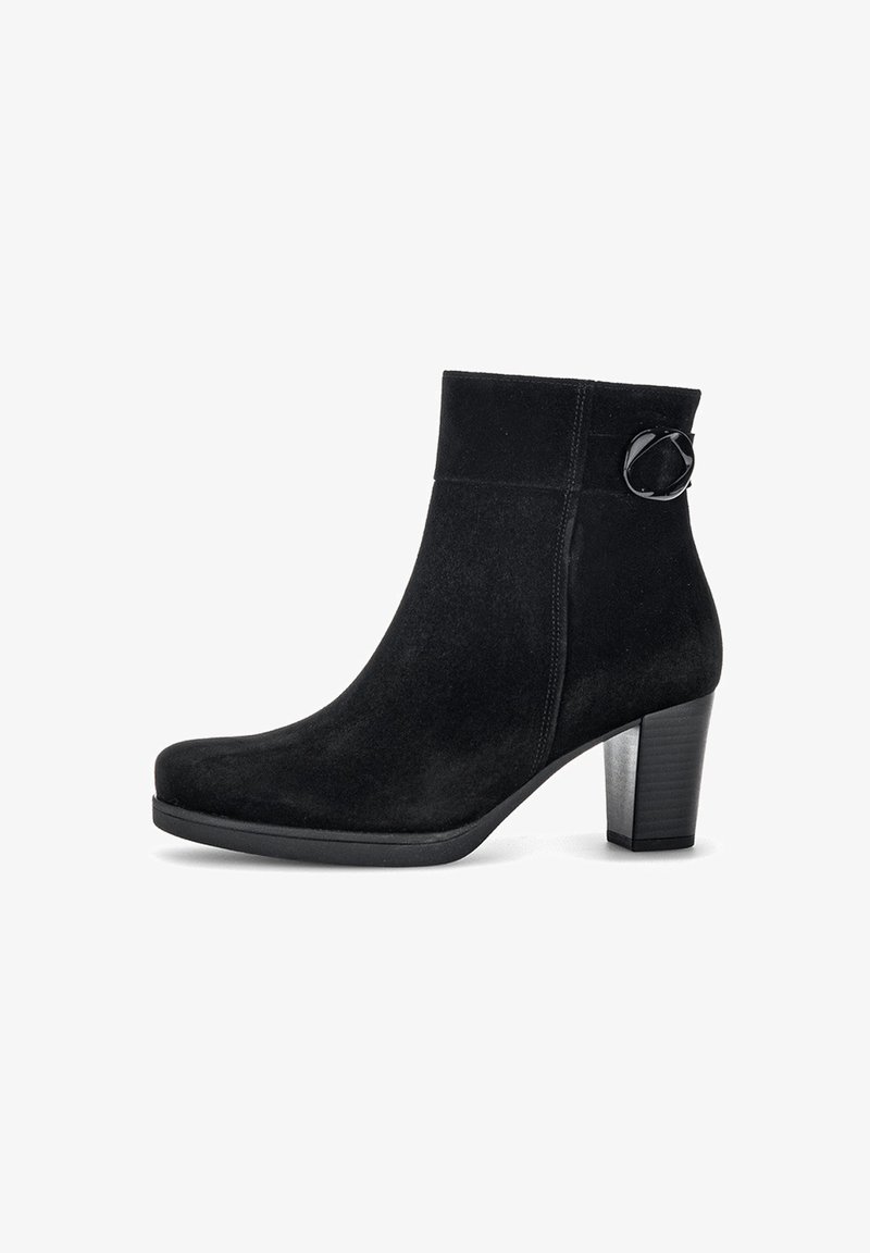 Black suede ankle boots with a rounded toe, a front seam, a decorative buckle, and a chunky heel. Smooth texture with a matte finish.