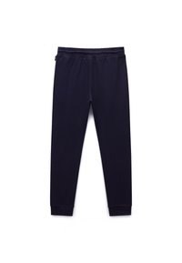 Granatowe dresowe spodnie z elastycznym pasem i ściągaczami przy kostkach, przeznaczone do noszenia na co dzień lub podczas aktywności sportowej, przedstawione na białym tle.