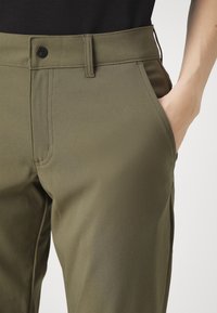Columbia BACK BEAUTY™ PANT - Lauko kelnės - stone green