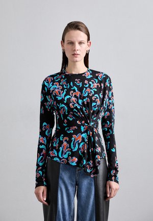Black long-sleeve top featuring colorful swirling patterns in turquoise, orange, and white. Includes a knotted detail at the waist.