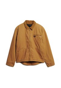 Bruine canvas jack met een rits aan de voorkant, puntkraag, twee voorzakken en een klein borstzakje. Heeft een licht afgeronde onderrand.