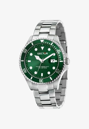 Orologio in acciaio inox argento con quadrante verde, indicatori luminosi e funzione data. Caratterizzato da una lunetta girevole e resistenza all'acqua fino a 100 metri.