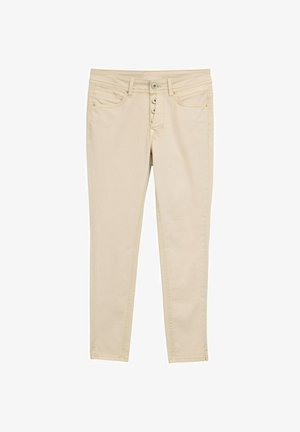 Béžové bavlnené skinny jeans s piatimi gombíkmi, prednými vreckami a jemnými detailmi prešitia. Hladká textúra a priliehavý strih.