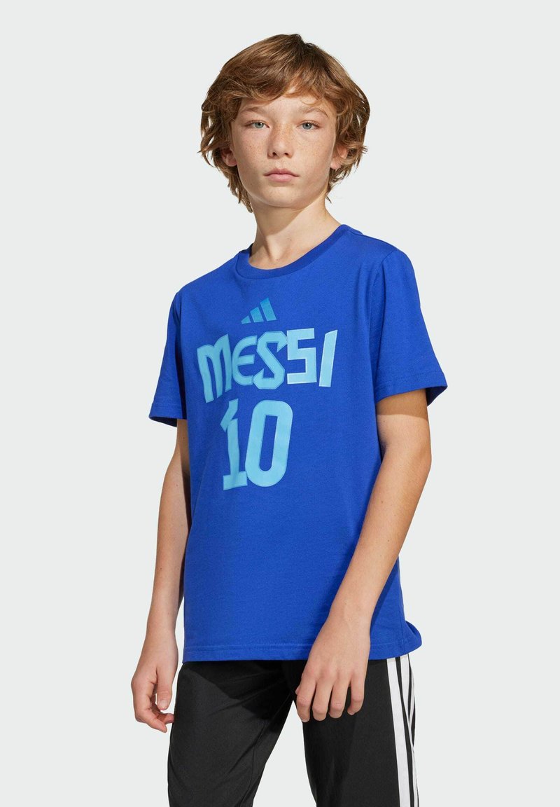 Blue short-sleeve t-shirt made of cotton, featuring "MESSI" and "10" printed in light blue on the front. Round neck design.