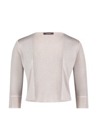 Ljusbeige cardigan med trekvartsärmar, öppen front och en slät, lätt glänsande yta. Har subtila sömnadsdetaljer på ärmarna.