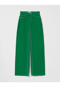 Gröna vida jeans med kontrasterande vita sömmar, framfickor och knappstängning vid midjan. Slät denimtextur.