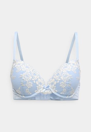 Lyseblå bh med blonder i elfenben, udstyret med polstrede skåle, justerbare stropper og en satin sløjfe i midten.