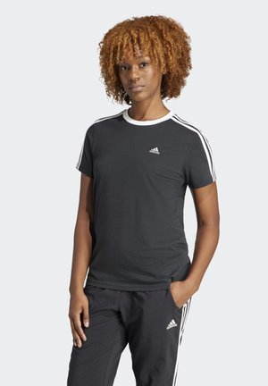 Maglietta atletica nera con colletto bianco e tre strisce bianche su ciascun spalle. Presenta un piccolo logo sul petto. Materiale in cotone morbido.