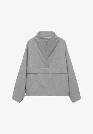 Pull léger gris à col zippé, avec un col haut et des manches longues. Fabriqué en tissu texturé avec un motif subtil et une coupe décontractée.