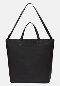 Sac fourre-tout en cuir noir avec doubles poignées et une bandoulière amovible. Présente une texture lisse et un design minimaliste.