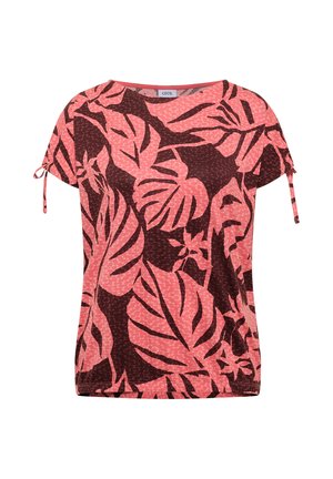 Haut à manches courtes rose et rouge foncé à motif feuilles tropicales, encolure ronde et petits liens ajustables aux manches.