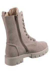 Szare skórzane buty z textured cholewką, sznurówką z przodu, zamkiem błyskawicznym z boku oraz masywną białą gumową podeszwą. Wyposażone w przytulne wykończenie.