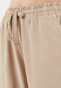 LELA FIT - Trainingsbroek - camel