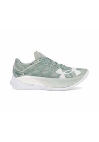 Scarpa da ginnastica verde chiaro con upper in tessuto testurizzato, suola bianca e grande logo. Presenta una punta arrotondata e un sistema di allacciatura per una vestibilità sicura.
