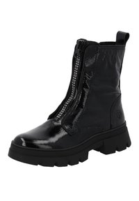 Botas de tobillo negras con un acabado patent brillante, que cuentan con una cremallera lateral y una suela de goma gruesa con un patrón de textura.