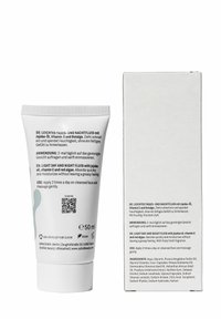 Letvægtscremetube med hvid krop, teal accent spirale og tekstureret låg. Indeholder produktdetaljer på tysk og engelsk; 50 ml.