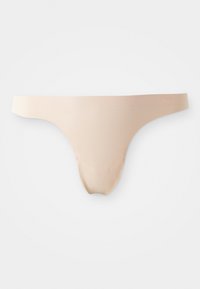 Nude thong apatiniai su lygiu, tamprių medžiagos tekstūra. Turintys minimalų dengimą ir besiūlį dizainą, tinkami diskretiškam dėvėjimui po drabužiais.