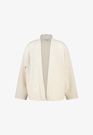 Roomkleurig doorgestikt jack met open voorzijde, lange mouwen en subtiel textuurpatroon van bladeren.