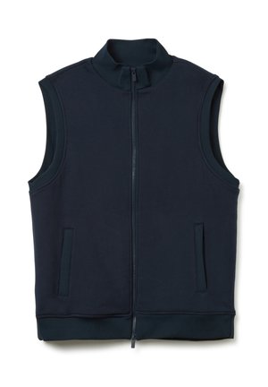 Gilet sans manches bleu marine avec un col montant, fermeture éclair à l'avant et deux poches latérales. Fabriqué en tissu doux et lisse avec une texture unie.
