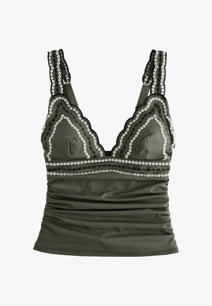 Oliivroheline top laineliste servadega, valge ja musta ringikujulise äärisega, rinnakorvi all kortsuline kangas ja laiad õlapaelad.