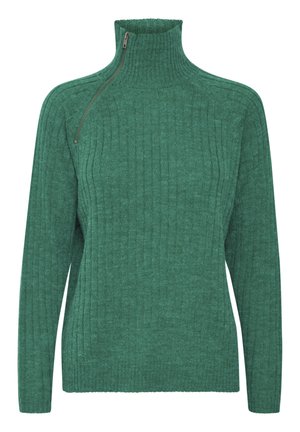 Grüner gerippter Strickpullover mit hohem Kragen, der einen halben Reißverschluss am Hals hat. Weicher Stoff und lockere Passform.