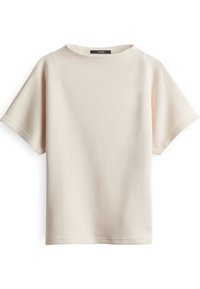 Top a maniche corte di colore crema realizzato in tessuto testurizzato con scollatura rotonda e vestibilità ampia, caratterizzato da un sottile motivo a nido d'ape.