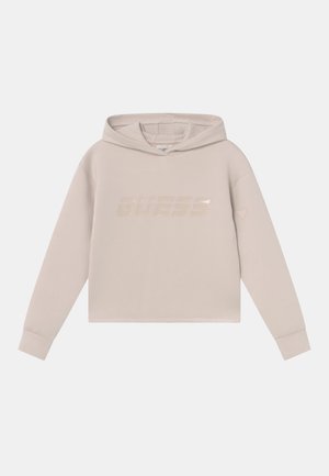 Lyse beige hættetrøje med lange ærmer og et diskret skinnende "GUESS"-logo henover brystet.