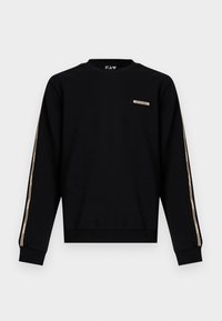 Melna garām piedurknēm sporta krekls ar bēšām emblēmām rotātām joslām gar piedurknēm un mazu taisnstūrveida EA7 Emporio Armani logotipu uz krūtīm.