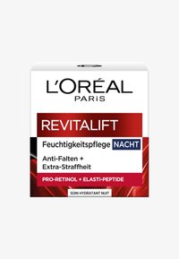 L'Oréal Paris Revitalift nattkräm låda, vit med röda detaljer, text på tyska. Nyckelingredienser: Pro-Retinol, Elasti-Peptid.