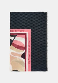 Woven scarf with a navy blue background featuring a geometric pattern and a bordered design in pink and muted colors, labeled "CASUAL IDENTITY."