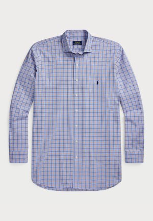 Chemise bleue à manches longues avec motif à carreaux orange et marine et logo Polo Ralph Lauren brodé sur la poitrine gauche.