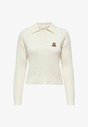 Kabelis adīts puloveris krēmkrāsā ar apkakles izgriezumu un trim pogām. Uz krūšu daļas ir neliels brūns teddy lācītis izšuvums.