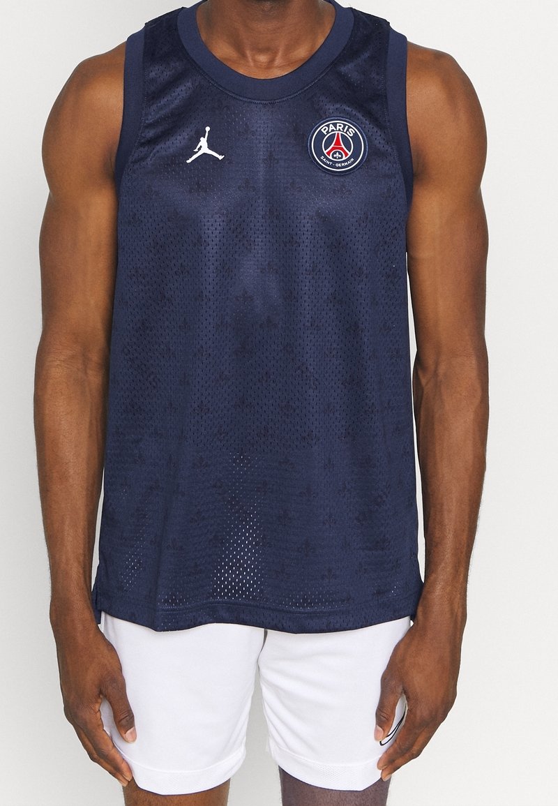 Námořnický basketbalový dres s pružnou texturou, na prsou s bílým logem Jumpman a kulatou nášivkou Paris Saint-Germain.