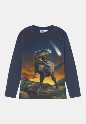 Long-sleeve navy shirt with a dinosaur graphic, featuring vibrant colors of orange, green, and blue depicting a prehistoric scene.
