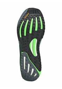 Semelle de chaussure de trail en caoutchouc noir avec des accents verts, semelle texturée pour l'adhérence et design segmenté pour la flexibilité.