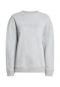 Un sweat gris avec un col rond côtelé, des épaules tombantes et le mot "SUNDAY" en relief sur le devant. Tissu doux et texturé.
