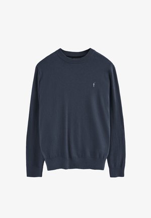 Maglione lavorato a maglia blu navy con scollo rotondo, polsini e fondo a coste, caratterizzato da un piccolo logo ricamato sul petto. Texture morbida.