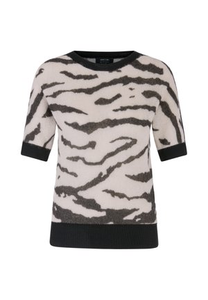 Short-sleeved sweater in soft fabric with a cream base and black tiger stripe pattern; features black ribbed neckline and hem.