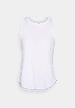 Valgete õlakateteta top, mis on valmistatud kerge ja siledast kangast. Omab ümarat kaelust ja kumerat allääre, millel on väikesed küljetükid.