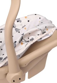 Marsupio per bebé con una struttura in plastica beige morbida, dotato di una fodera in tessuto bianco decorata con pois neri e pesca e disegni a mano.