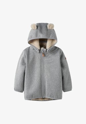 Hallide hallitusjope, millel on kapuuts ja karu kõrvad, pehme sisemus ja eesmine tõmblukk. Tõmblukule on lisatud heledat tan värvi aktsente.