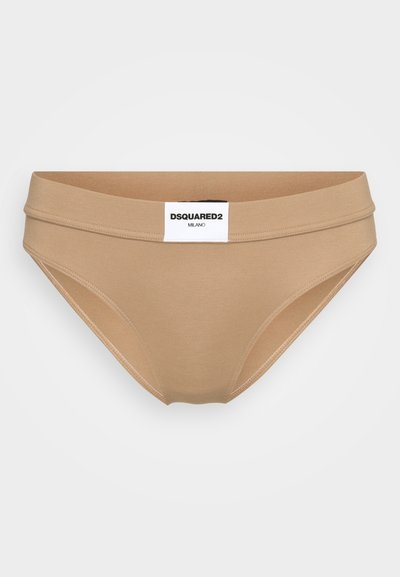 Beige bomuldsbikini med en bred, glat elastik, der har et sort og hvidt "DSQUARED2 MILANO"-mærke fortil.