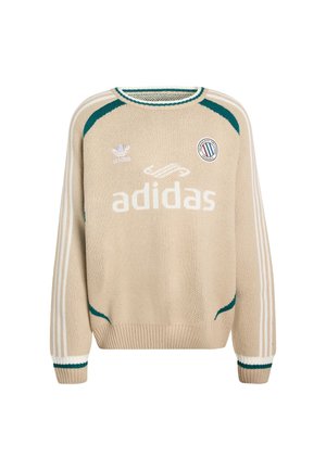 Beige strikket sweater med grønne detaljer, hvide striber på ærmerne og "adidas" logo. Har rund hals og ribstrikkede manchetter og kant.