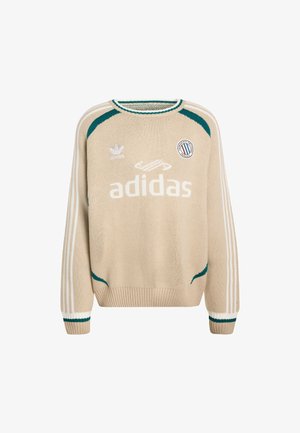 Beige strikket sweater med grønne detaljer, hvide striber på ærmerne og "adidas" logo. Har rund hals og ribstrikkede manchetter og kant.