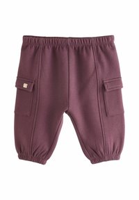 Burgundy joggerbukser lavet af blødt stof, med elastisk talje, to sidelommer og samlede manchetter for en behagelig pasform.