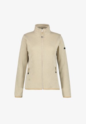 Beige Zip-Jacke mit gemustertem Textil, hohem Kragen, zwei Seiten Taschen und kontrastierendem Besatz am Saum und an den Bündchen.